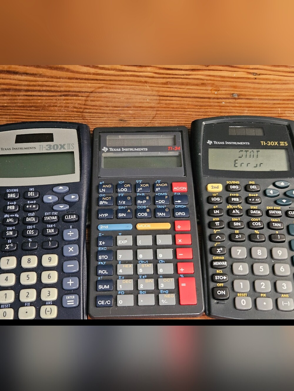 Texas Instruments Scientific Calculators in Black, Gray, Red, Blue, Yellow